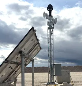 A camera unit on its mast, powered by a solar panel
