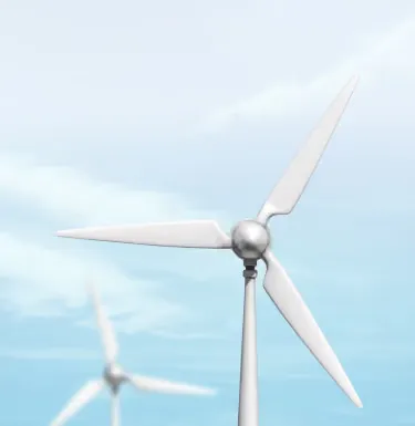 Wind turbines seen from below against a clear sky