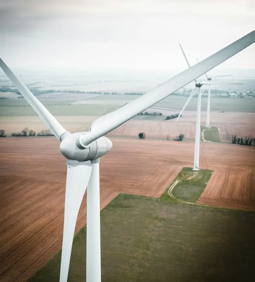 A thermal still of a bird track against a turbine